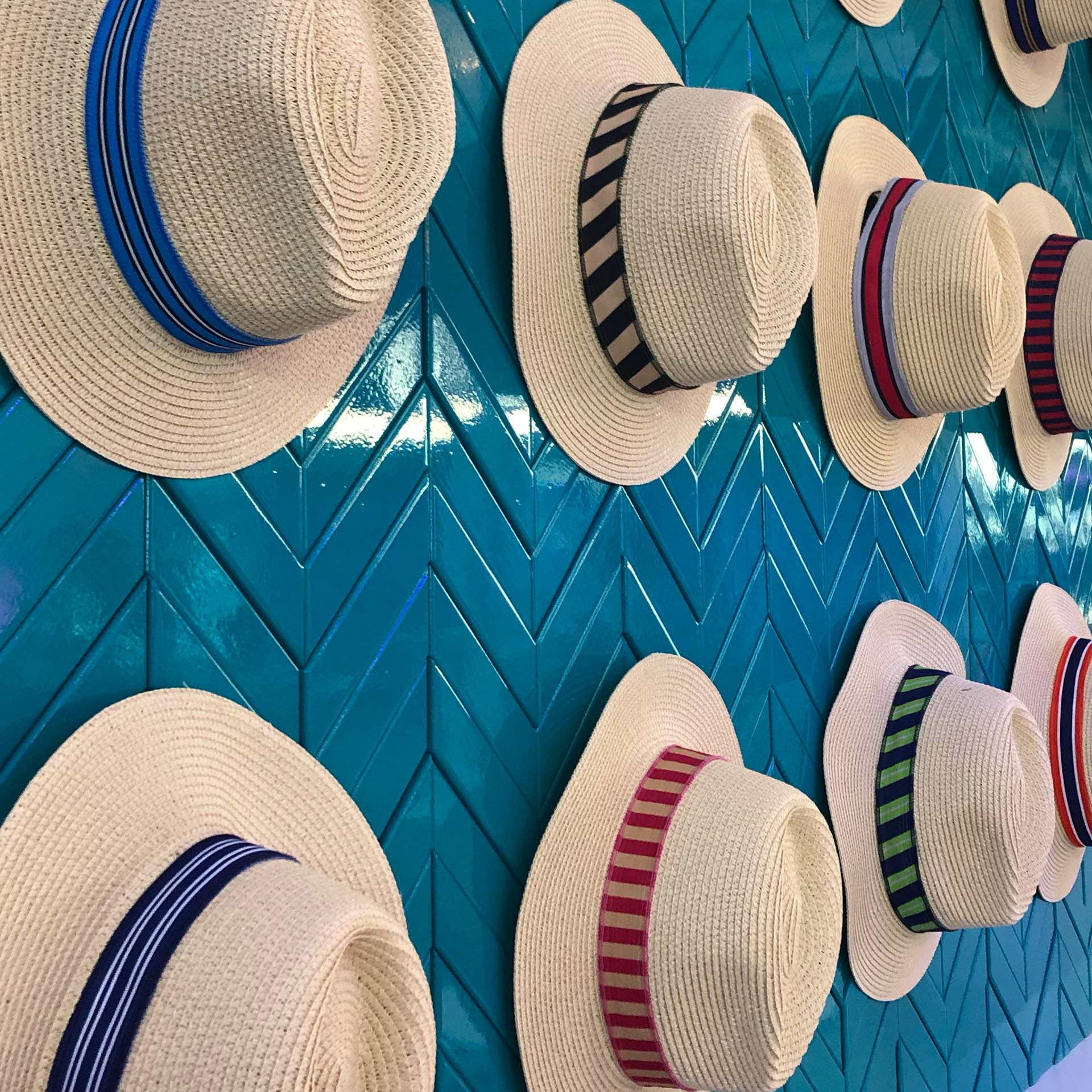 Wall of cabana hats