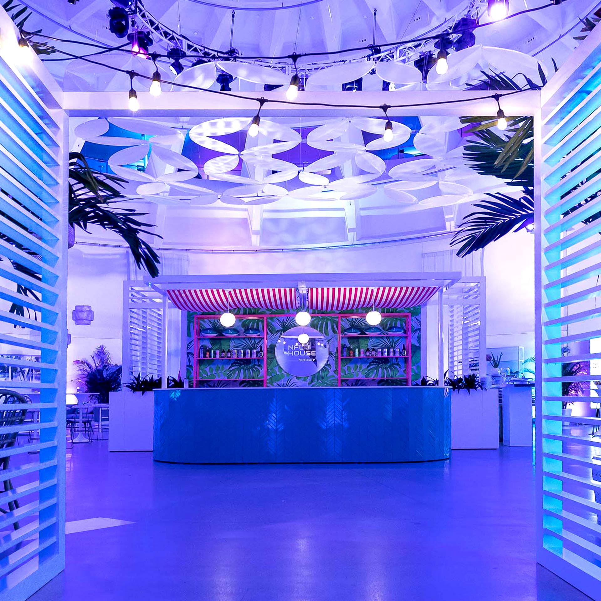 Beautiful bar area designed by GMR Marketing looks and feels like a tropical bar that would normally exist on a beach