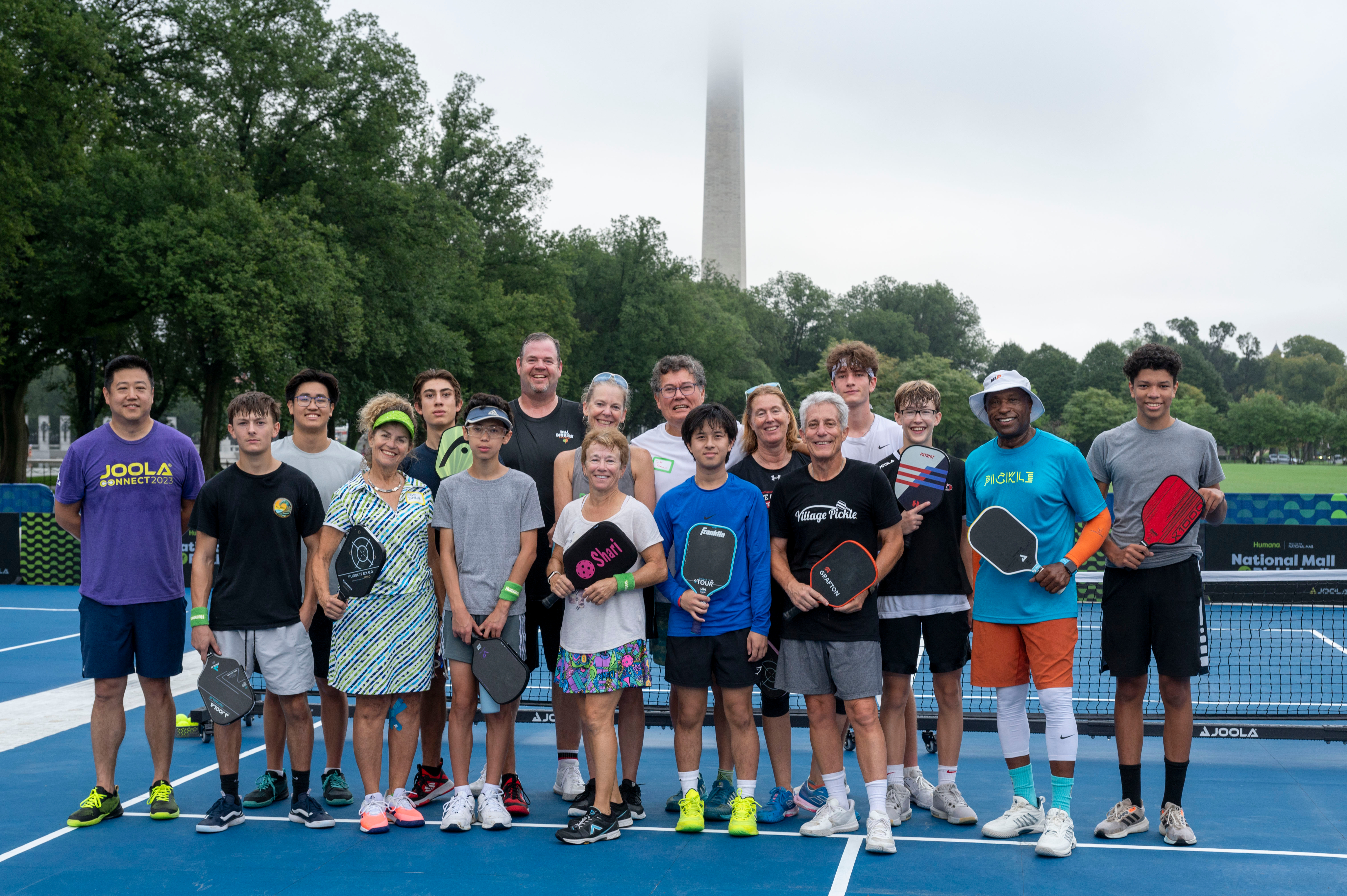 Group shot of picklers on the court in front of the Washington Monument.