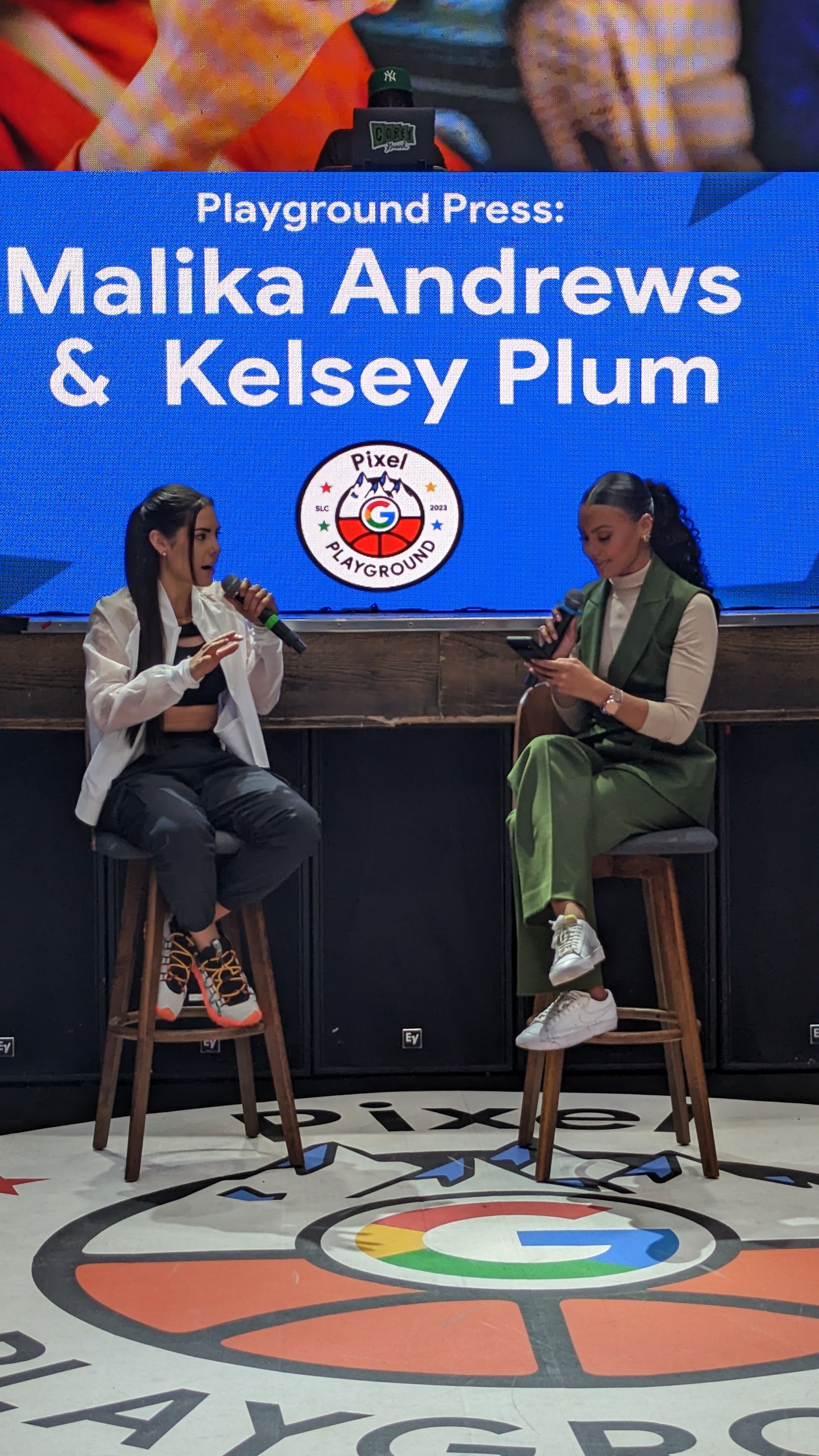 Malika Andrews and Kelsey Plum speaking to crowd at the Playground Press Talk.